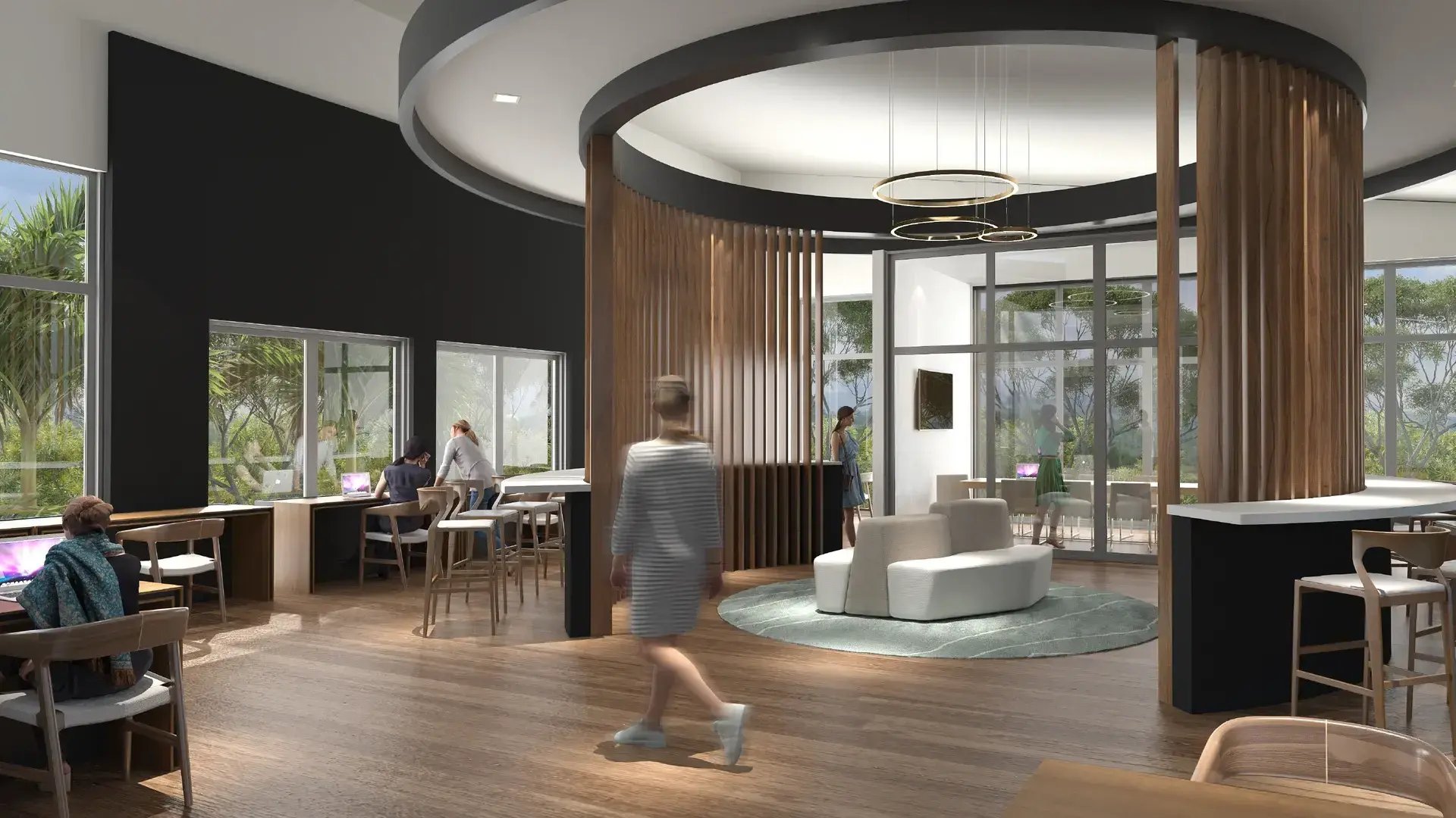 Render del espacio de coworking en Casa Club de Condominio Nasara, Santa Ana. Muestra mesas de trabajo junto a ventanales, estaciones tipo barra, sala de espera circular con separadores de madera y diseño contemporáneo.